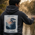 Charcoal melange hoodie, back graphic print with “still water” and “still mind”