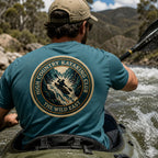 Organic Tee—kayaking club logo on turquoise crew neck T-shirt, back view