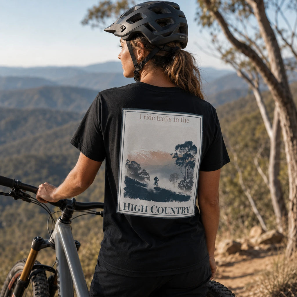 Black organic T-shirt with back landscape graphic and text