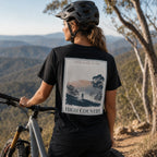 Black organic T-shirt with back landscape graphic and text