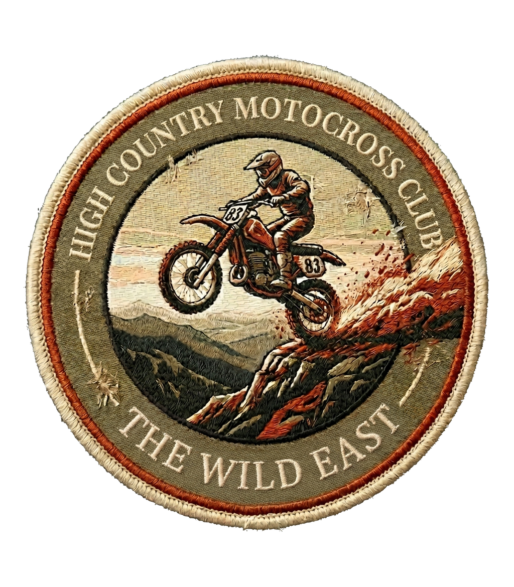 Embroidered circular motocross club patch with riders and arc text detail