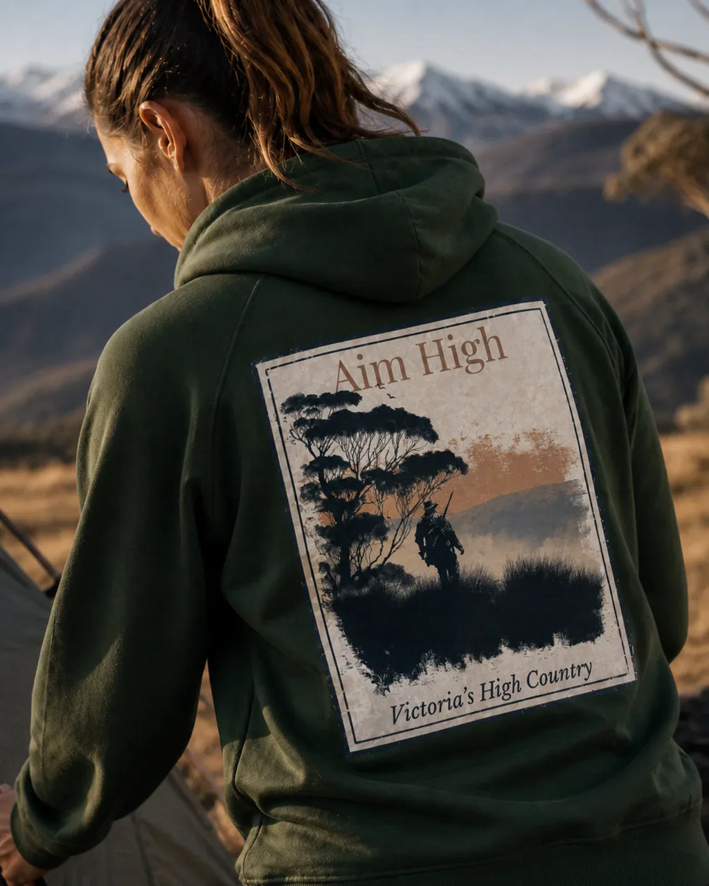 Green eco hoodie with large back graphic featuring trees and rider