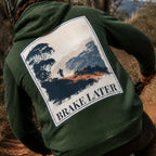 Green eco hoodie with large back graphic reading “BRAKE LATER” and rider scene.