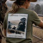 Organic Tee Cattleman Country in olive green with large back graphic “Victoria’s High Country”