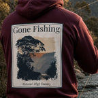 Eco hoodie in dark burgundy with large back “Gone Fishing” graphic and hood.