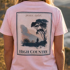 Organic tee rosé, back graphic “peace quiet” and “High Country” text block