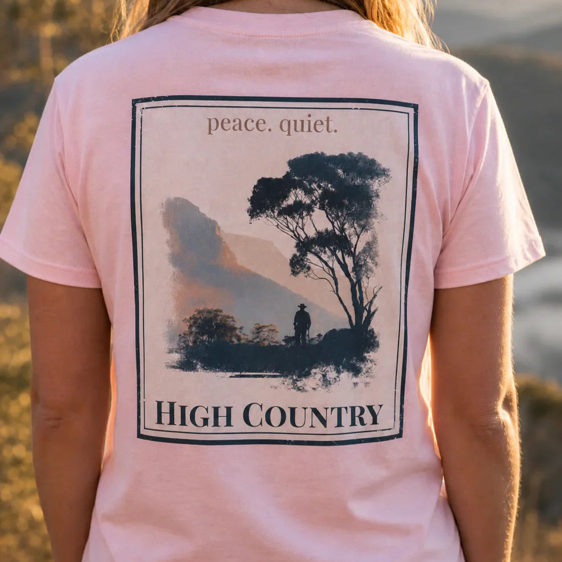 Organic tee rosé, back graphic “peace quiet” and “High Country” text block