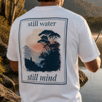 Organic T-shirt, white, back graphic "still water still mind" in frame