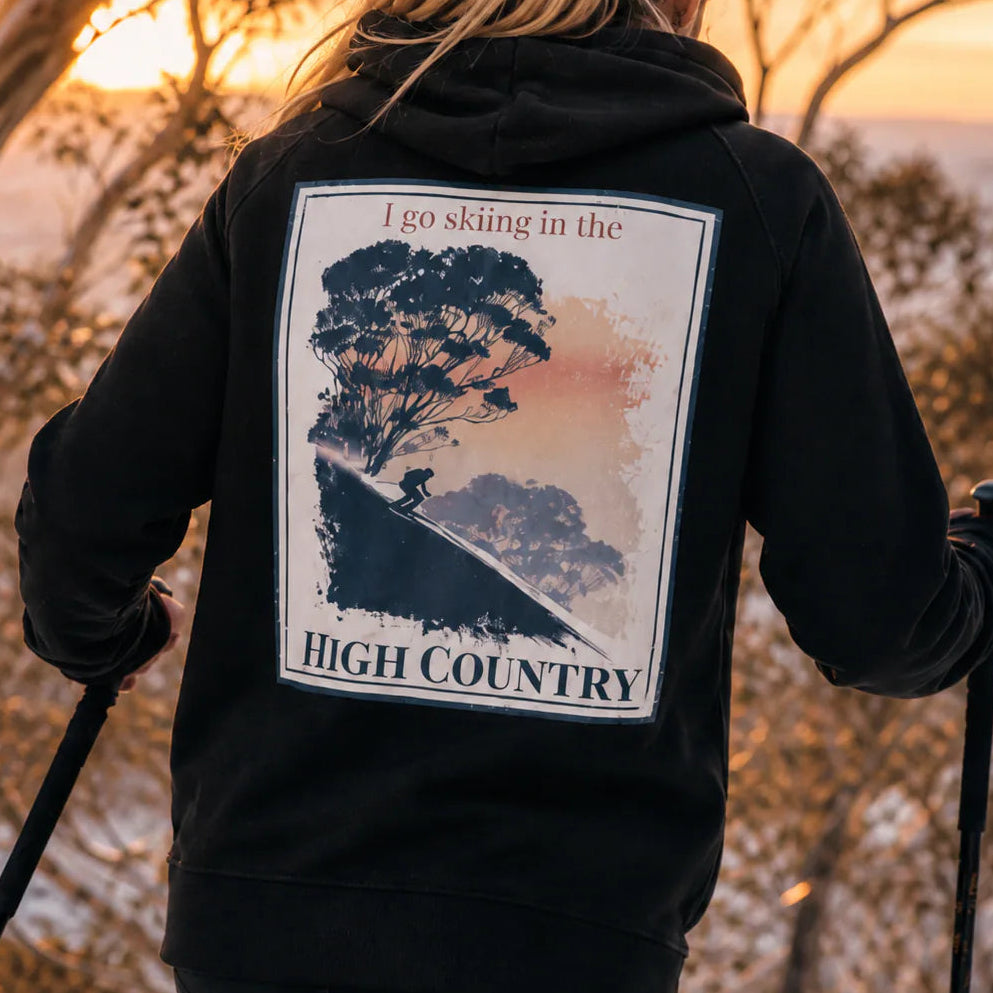 Black pullover hoodie with hood, front pocket, and large back “High Country” graphic.