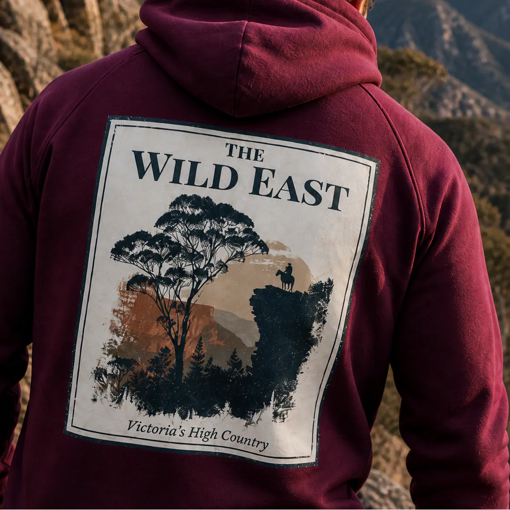 Burgundy eco hoodie with large square Wild East back graphic and trees print