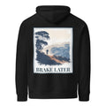Black eco hoodie with back print reading “BRAKE LATER” over mountain and bike scene.