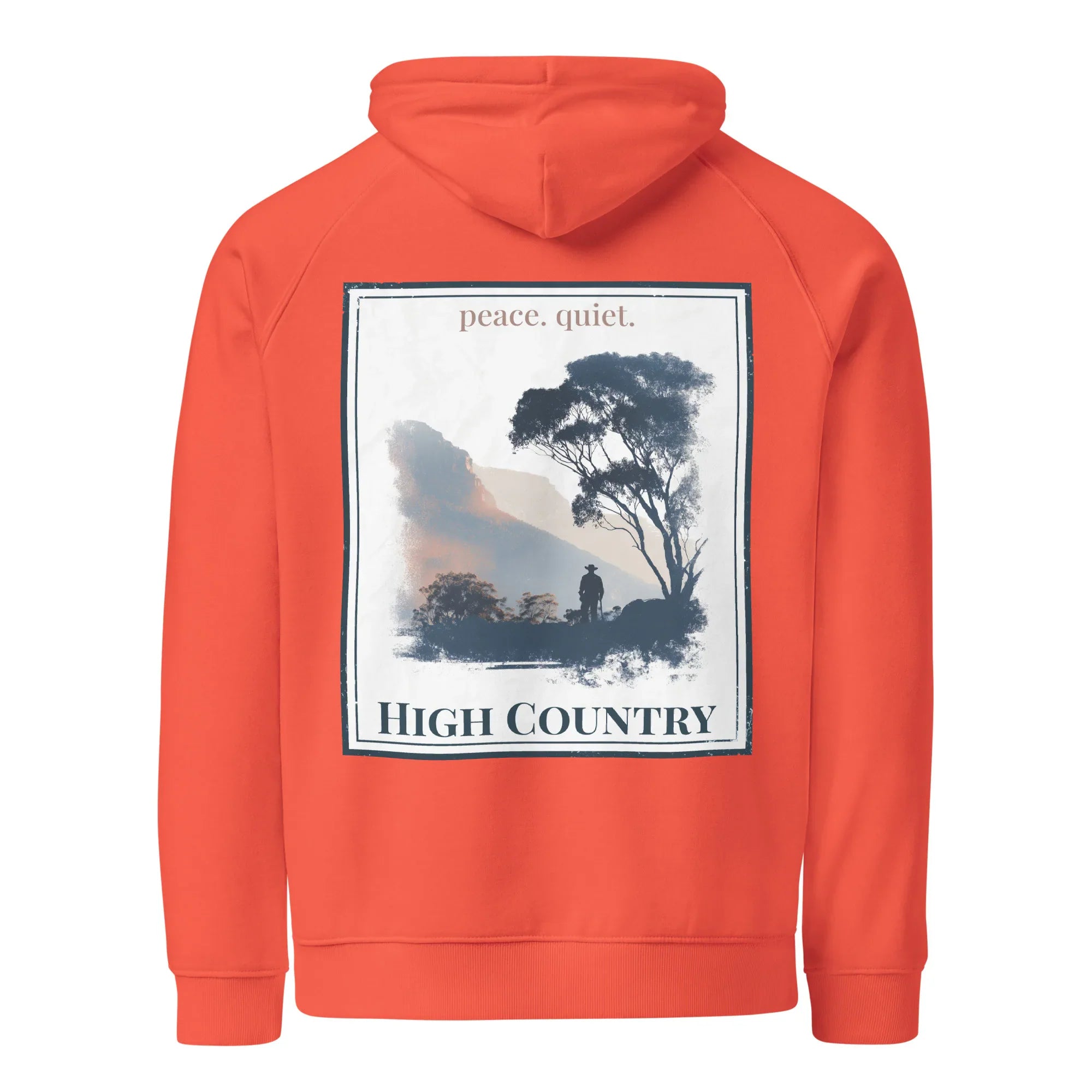 Burnt orange hoodie with back graphic print, hooded sweatshirt style, framed landscape artwork.
