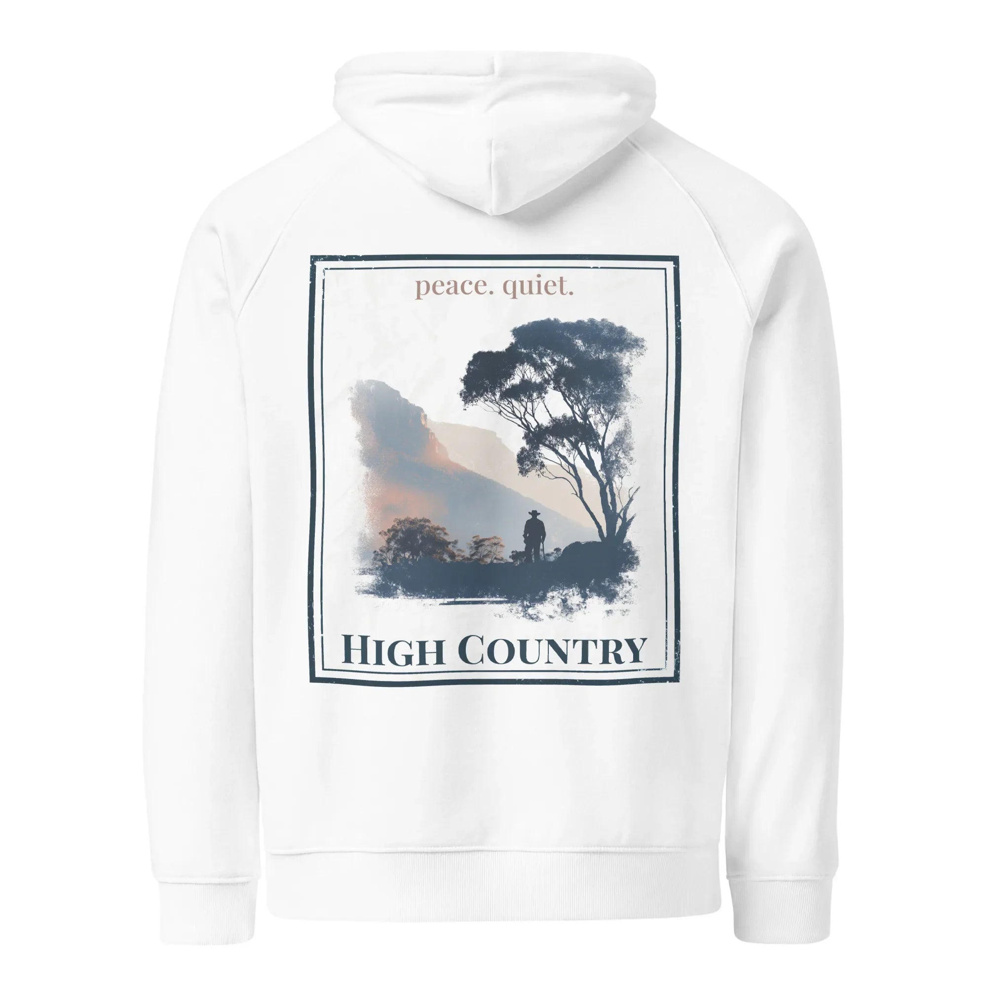 White hoodie with back graphic print, hooded sweatshirt style, framed landscape artwork.