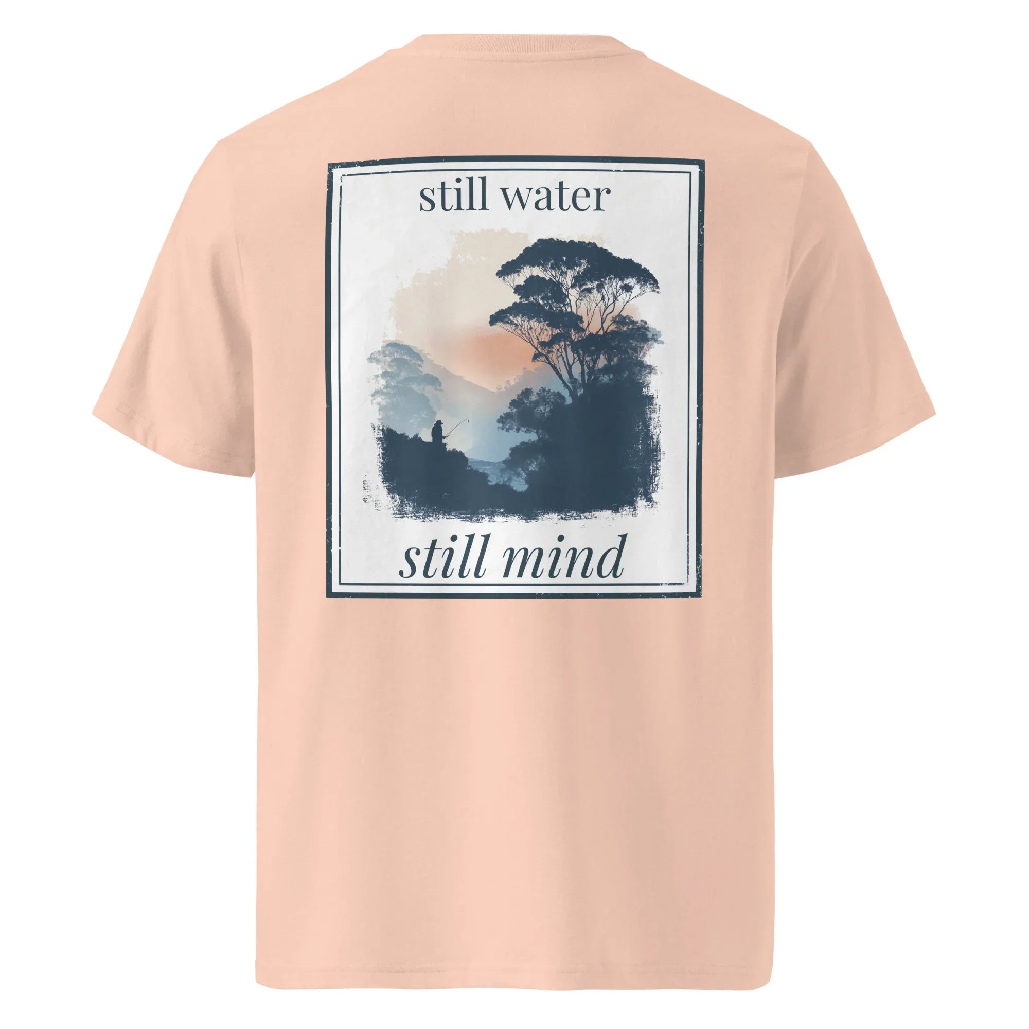 Organic tee in peach pink with back graphic panel and “still water / still mind” text