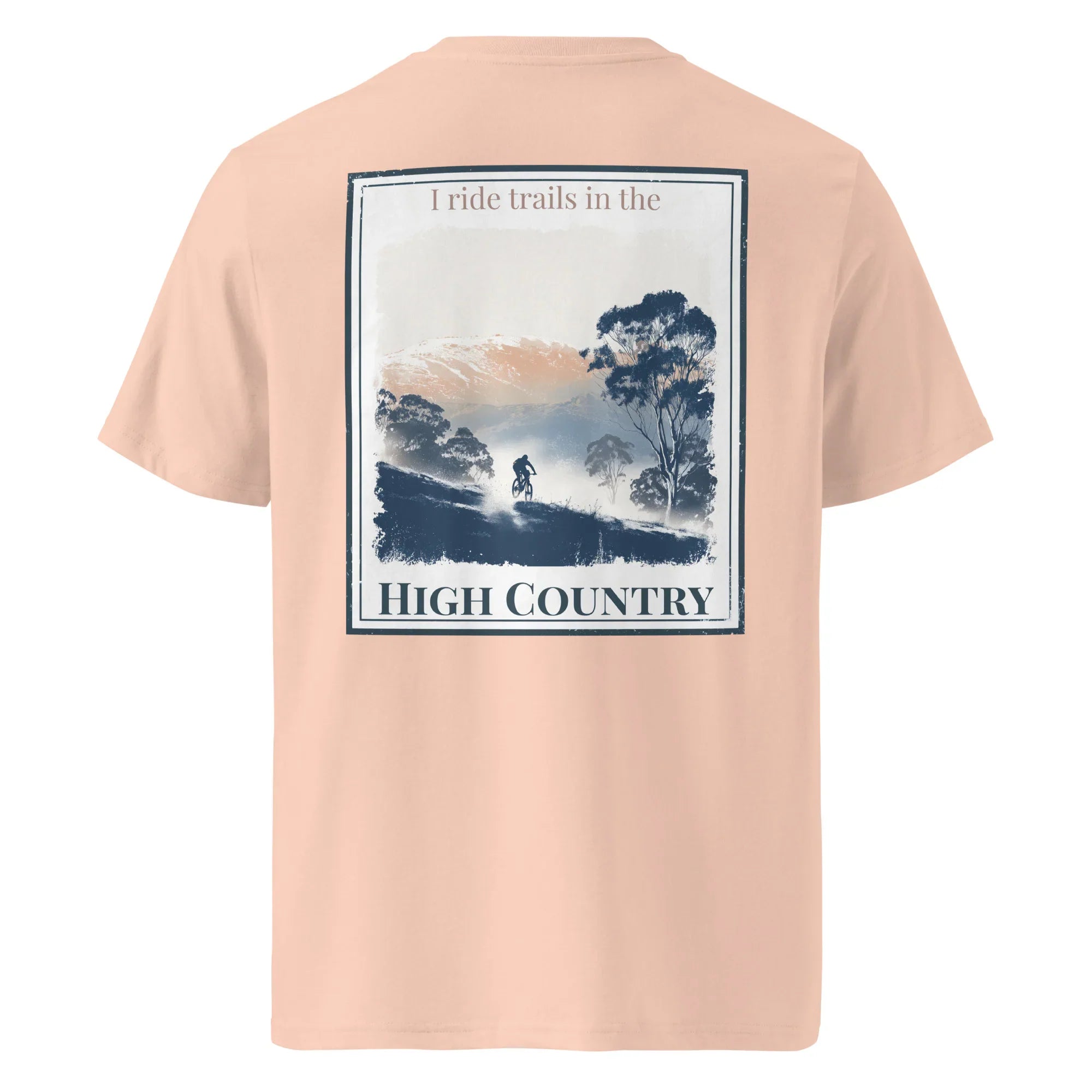 Organic Tee in Soft Pink, back graphic print: “I ride trails in the” and “HIGH COUNTRY”.
