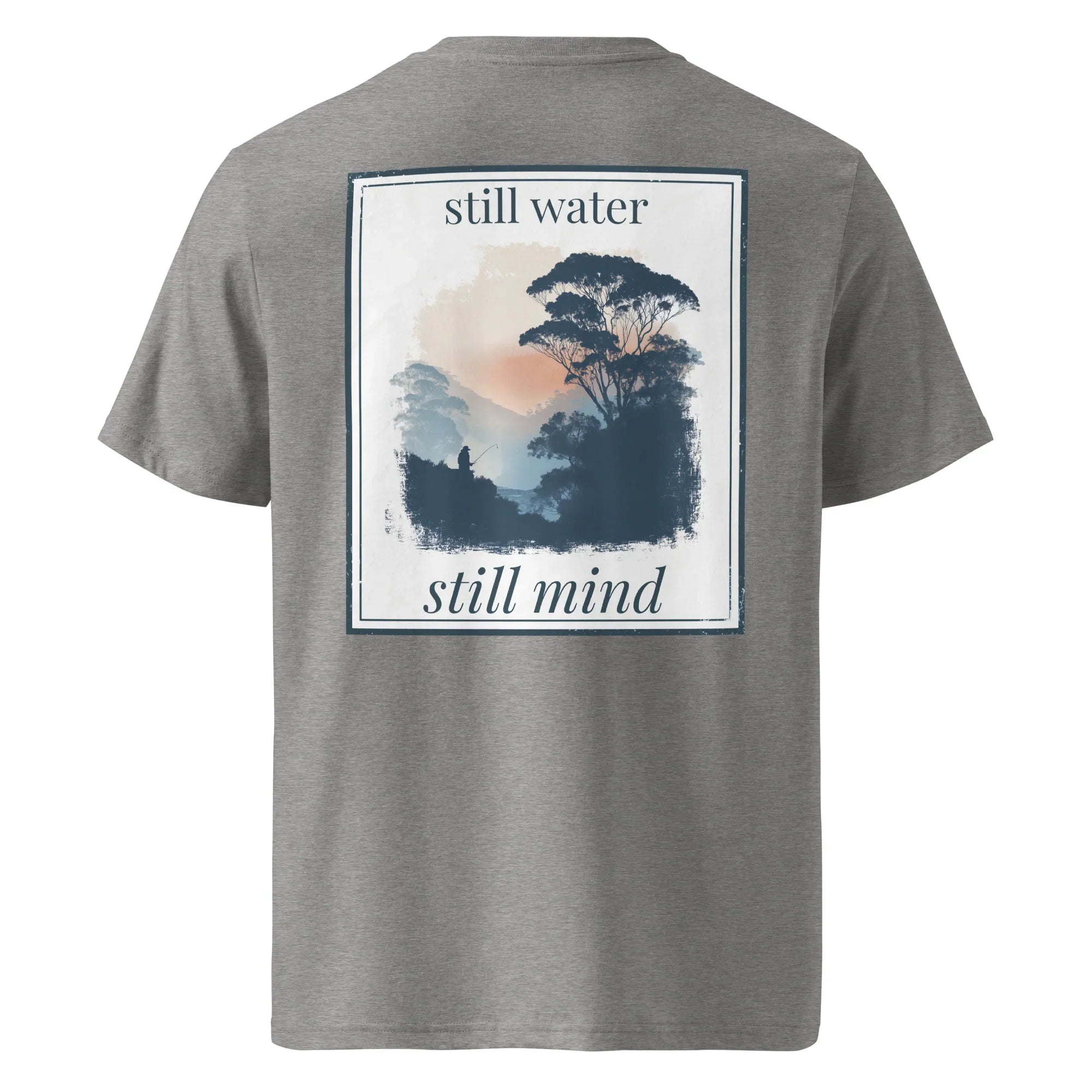 Organic tee in dark heather grey with back graphic panel and “still water / still mind” text