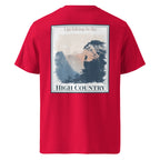 Red organic tee with back hiking landscape graphic and “HIGH COUNTRY” text