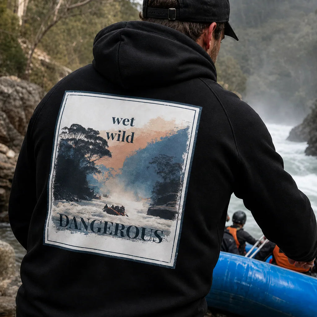 Black hoodie with back graphic patch reading wet wild and DANGEROUS